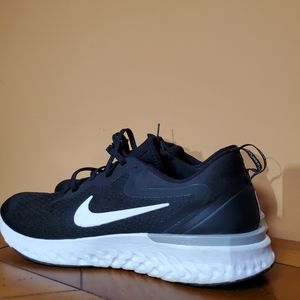 Black and white nike running shoes